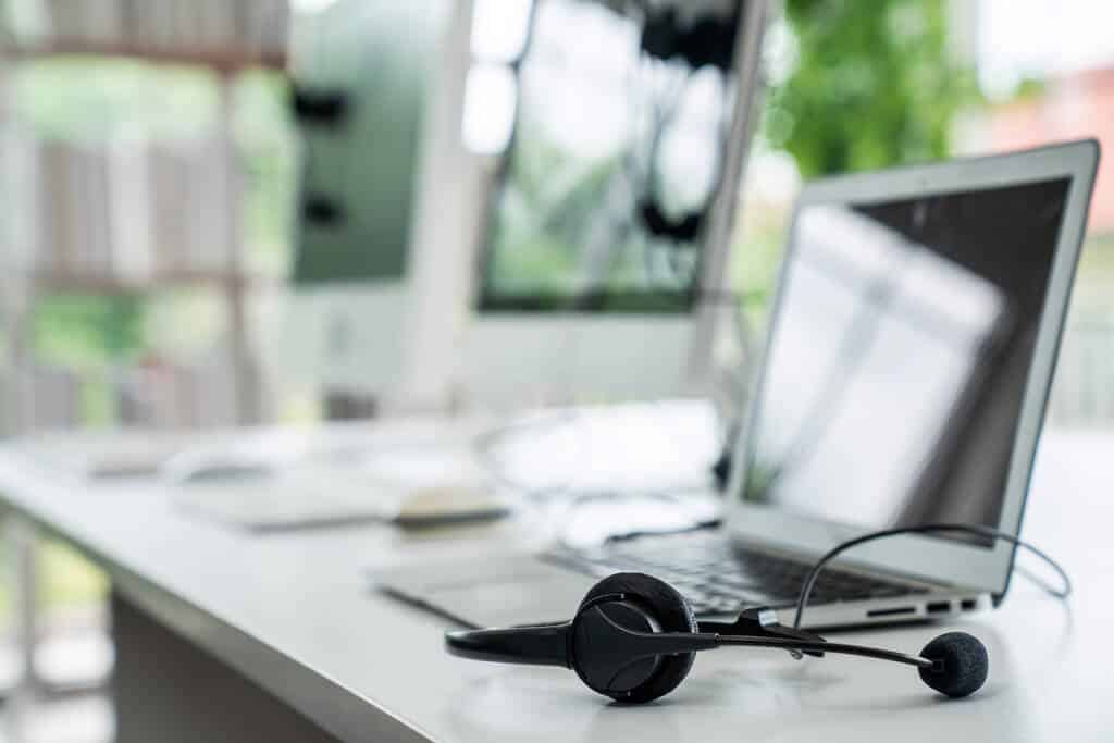 An office laptop and a headset.